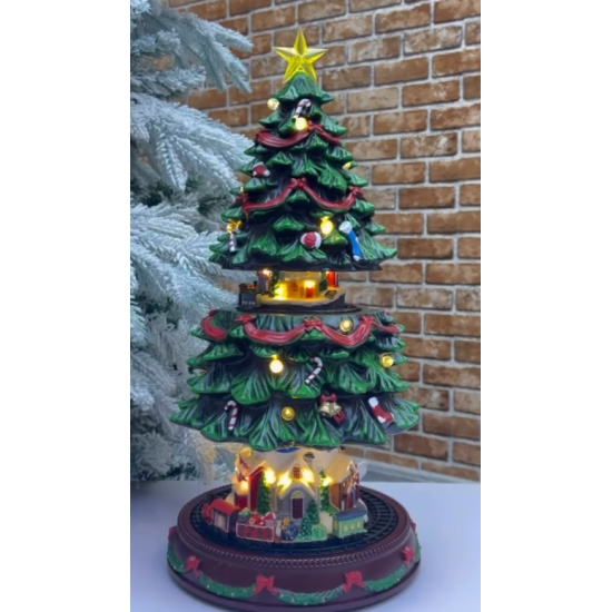 Peme per Krishtlindje me Hapje dhe Muzike 